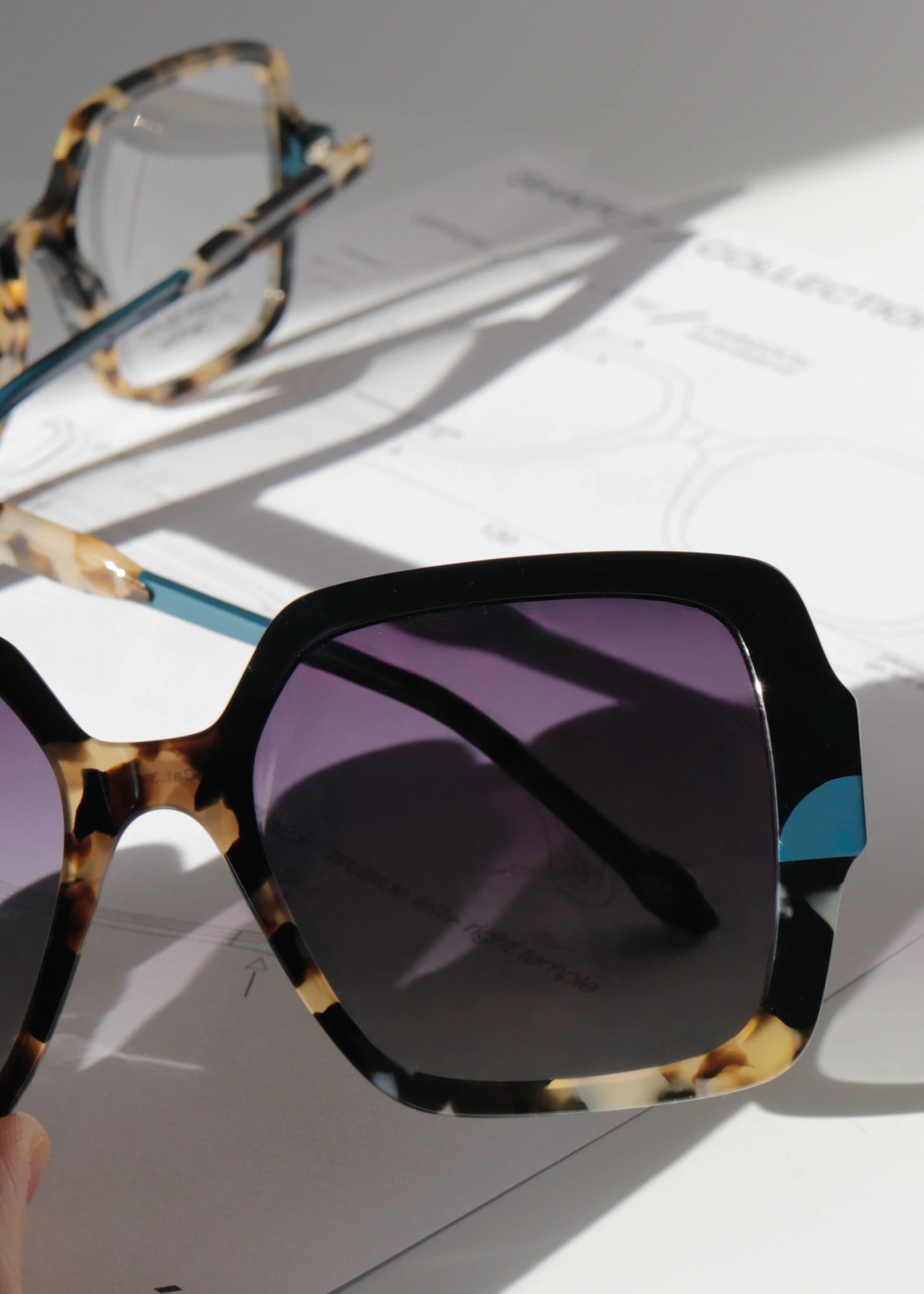 AEPONEM sunglasses with tortoiseshell detailing on design drawings