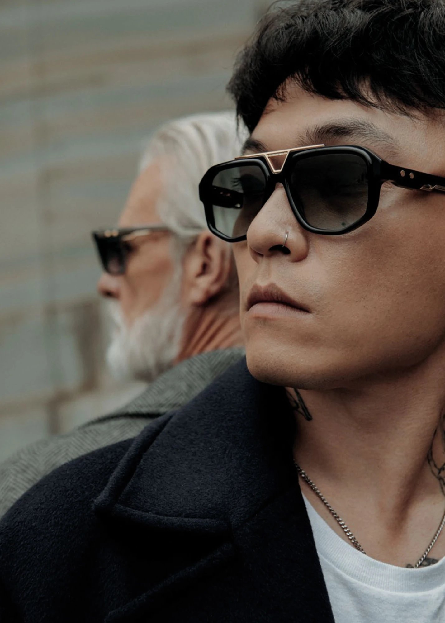 Einstoffen campaign portrait with dark geometric sunglasses