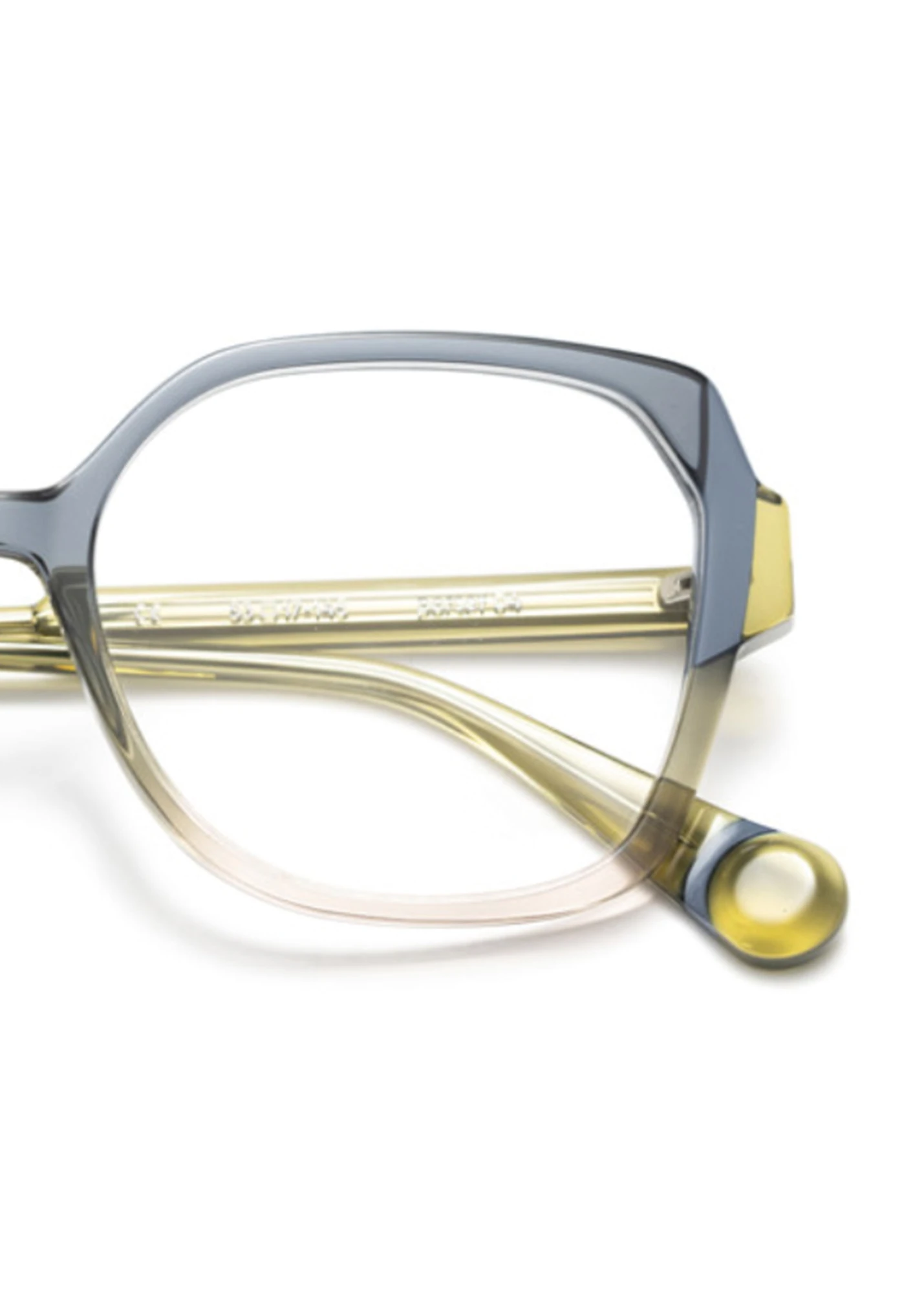 Close-up of a translucent grey and yellow LEPARC optical frame