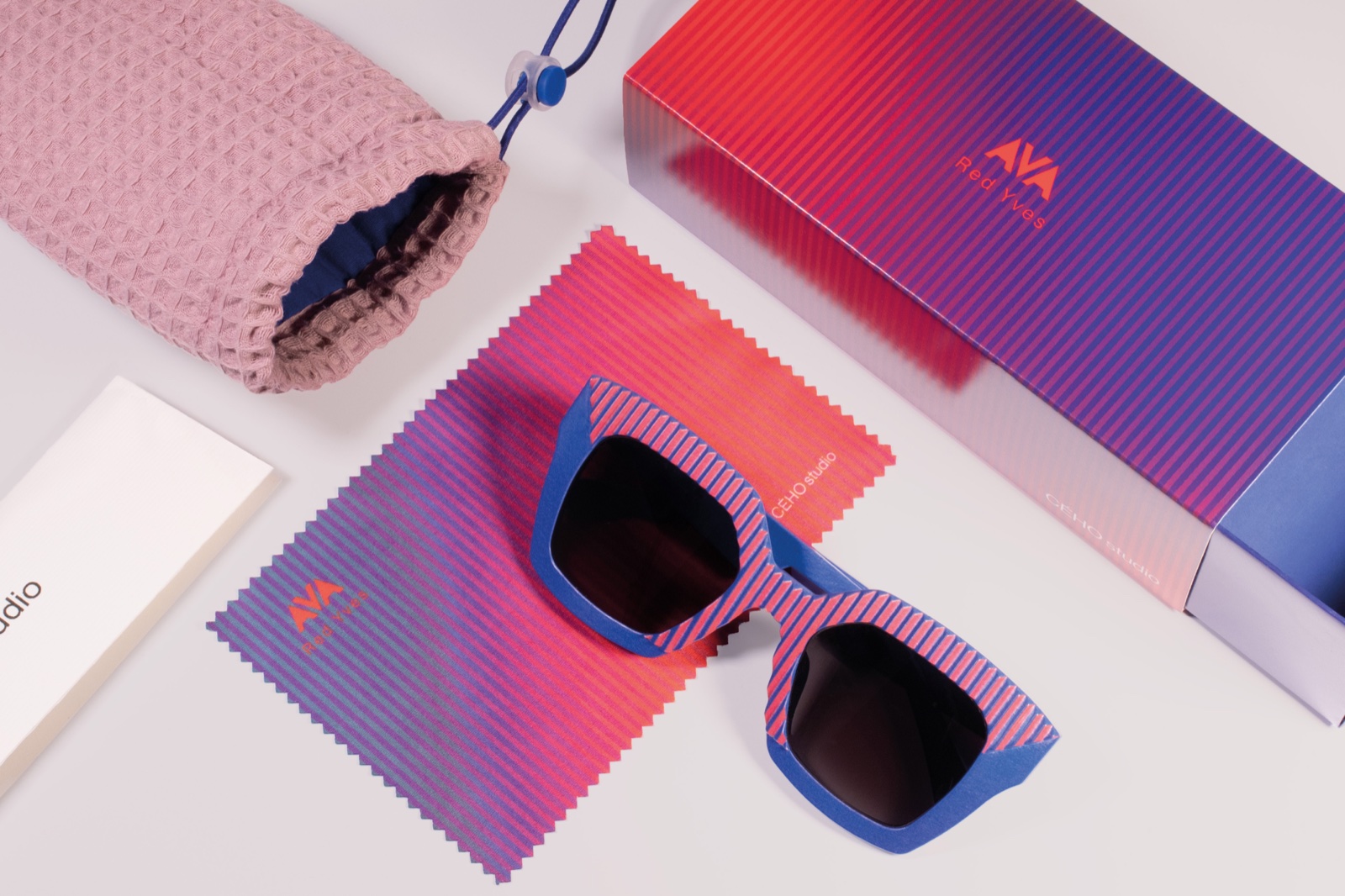 AVA Red Yves sunglasses with packaging and accessories
