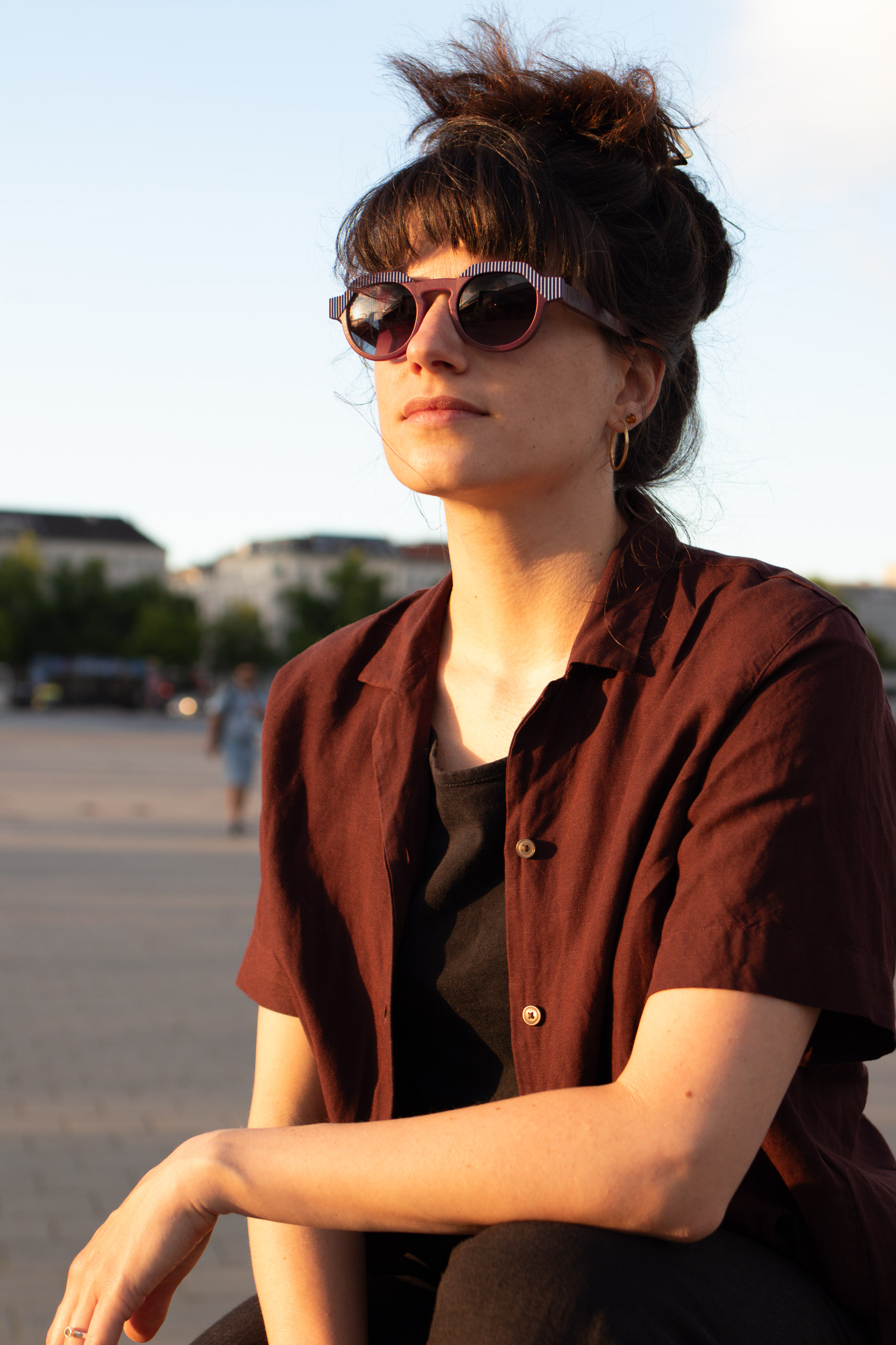 Mira wearing CÉHO studio JAMEI wine and sky sunglasses