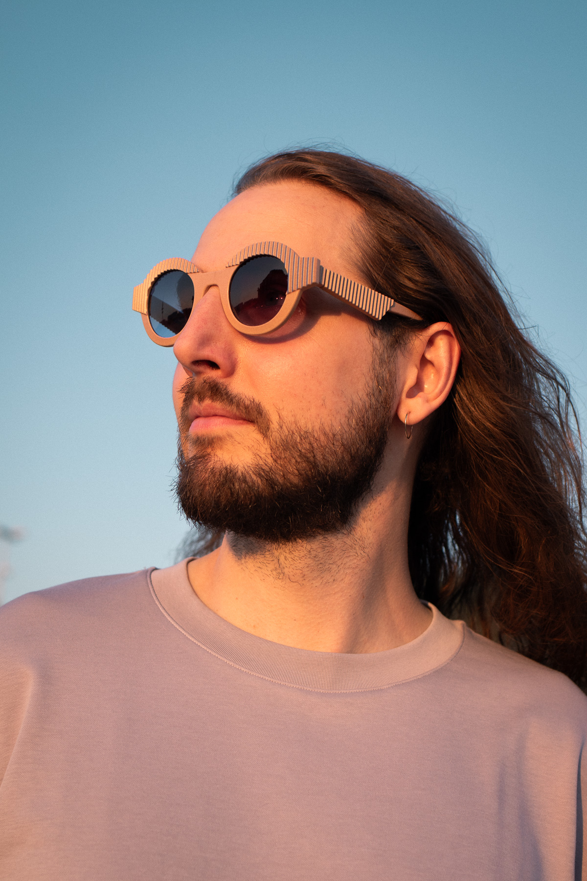 Kjell wearing CÉHO studio OYA camel and cobalt sunglasses