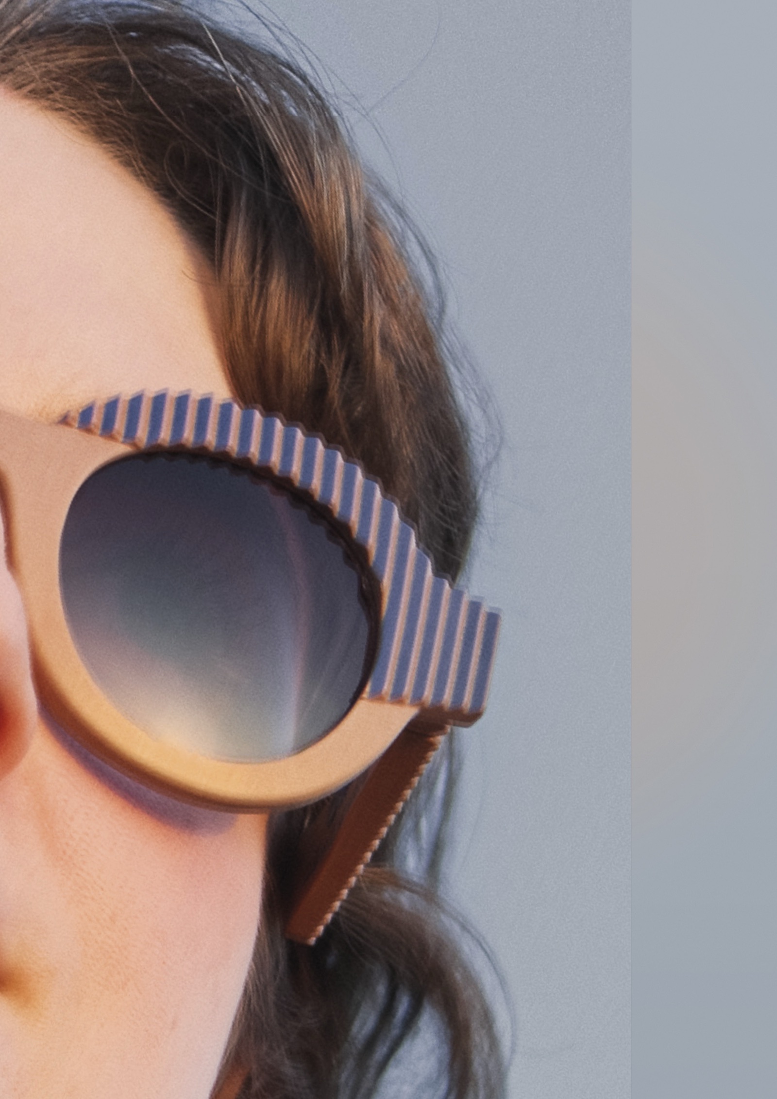 Janine wearing CÉHO studio OYA camel and cobalt sunglasses